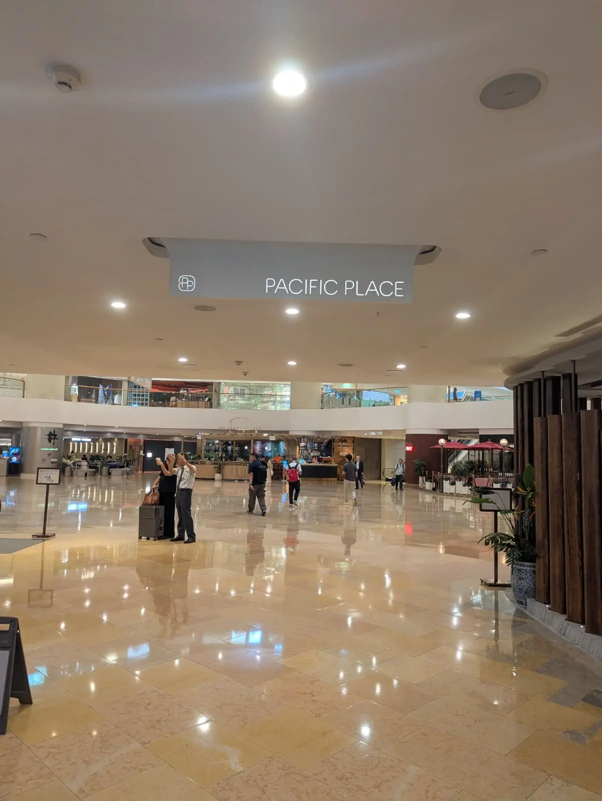 Step 2: After entering Pacific Place, turn left, take the escalator up, then keep left
