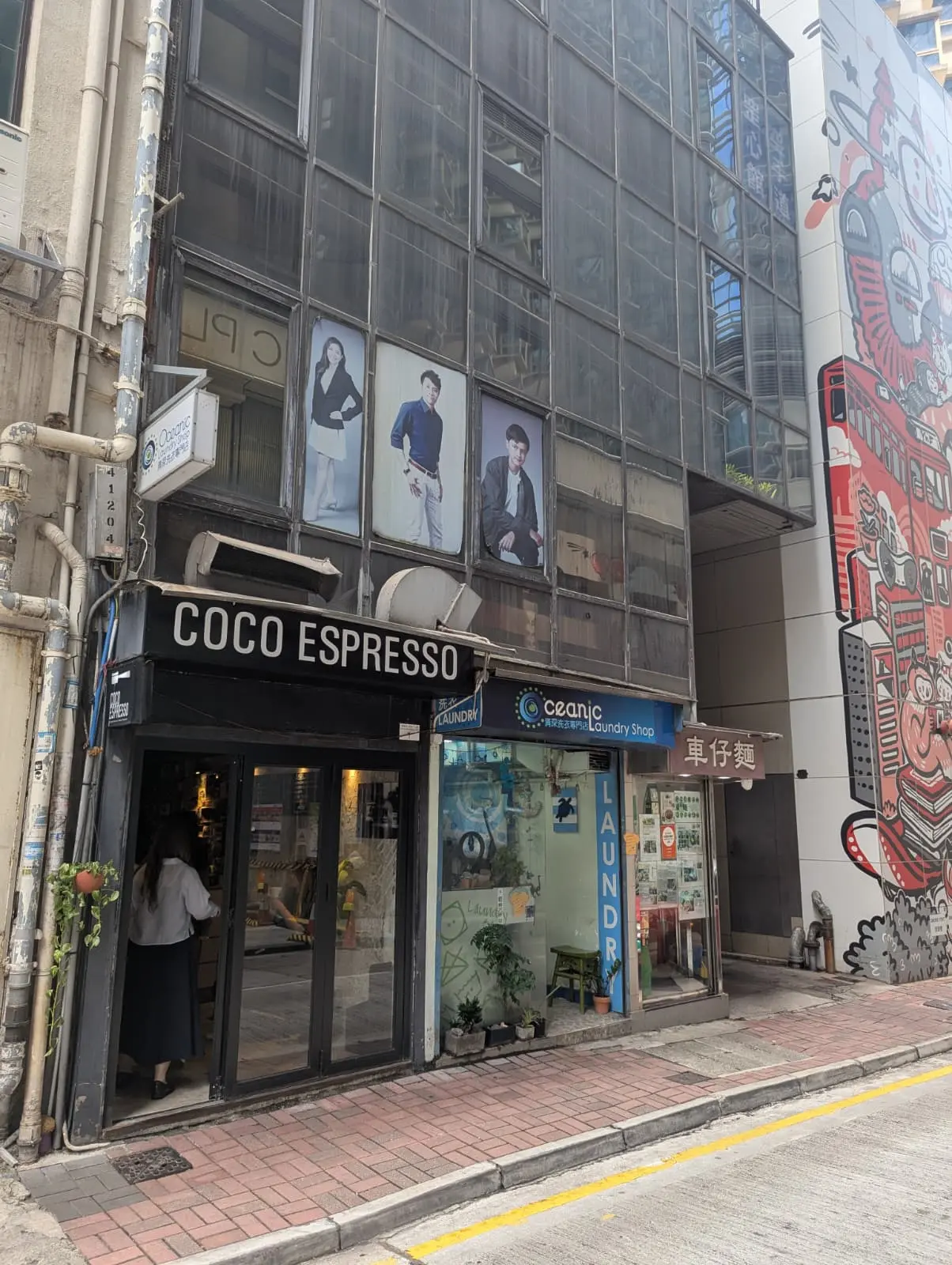 Step 8: When you see the cart noodles shop, turn into the side lane and you will see Anton Building